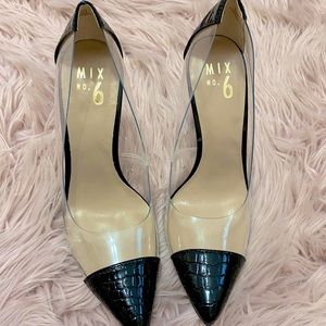 Clear and black pointed toe pumps. Never worn.